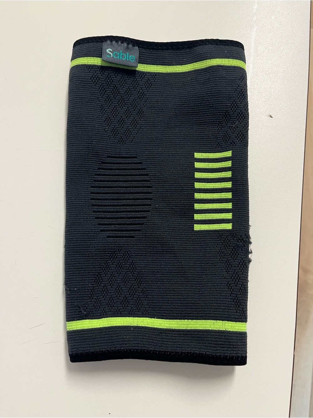 Sable Black knee brace with Neon Green Accents